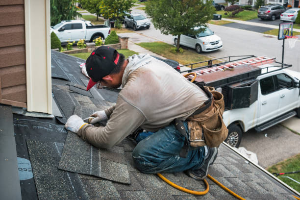 Professional Storm Damage Roof Repair technician working in Godley, TX